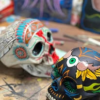 hand‑painted pinstriping on skulls