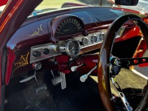 Pinstriped dash with pure hot‑rod soul.