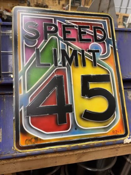 “Hand‑painted hot‑rod pinstriping by Sandi P in Granby Missouri.”